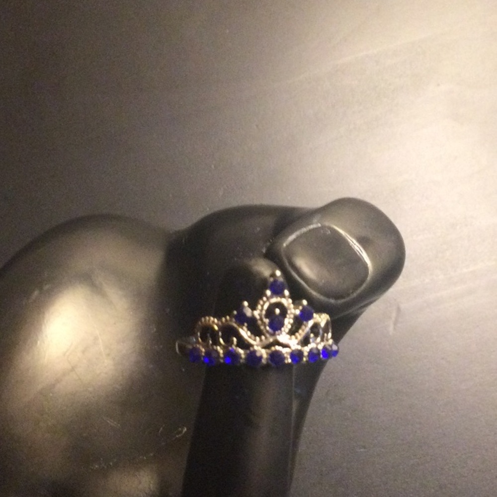 Silver and blue sapphire crown ring
